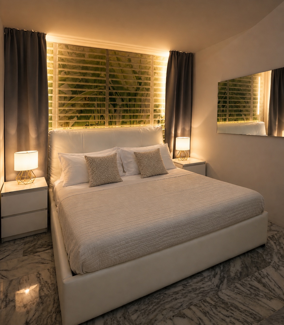 Luxury master bedroom in a private Milan residence with double bed, chandelier and quiet atmosphere